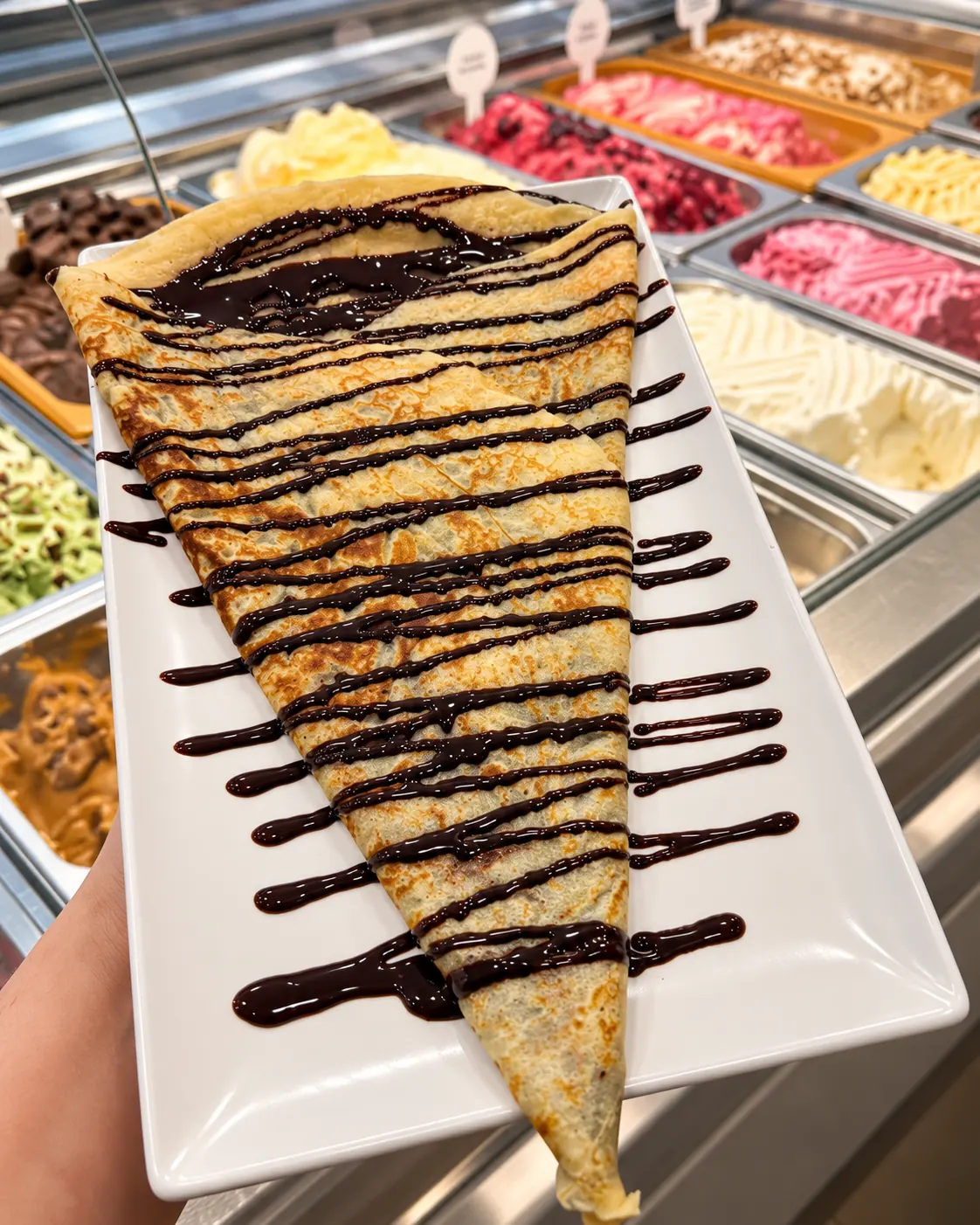 Crepe con sirope de chocolate